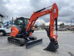 2026 Kubota KX057-5  includes heat, A/C, angle blade, 2X AUX hydraulics, coupler, hydraulic thumb, dig bucket