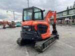 2026 Kubota KX057-5  includes heat, A/C, angle blade, 2X AUX hydraulics, coupler, hydraulic thumb, dig bucket - Image 3