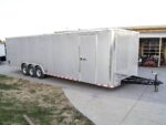 8.5x32 Silver Enclosed Car Hauler Trailer With Ramp and side door (3) 7K Axles 21k GVWR